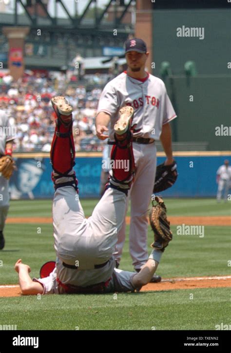 Boston Red Sox Catcher Jason Varitek Is Feet Up On The First Base Line