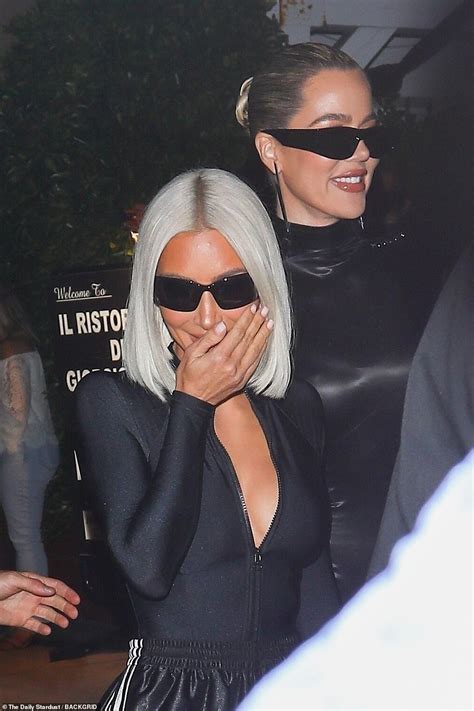 Kim Kardashian Bares Her Cleavage In Bodysuit While Khloe Kardashian