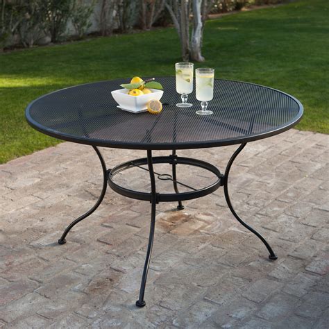 Crafted from the metal frame, the rattan group featuring the cushions provides a perfect perch for you during a family feast or party on cool summer nights. Woodard Stanton 48 in. Round Wrought Iron Patio Dining ...
