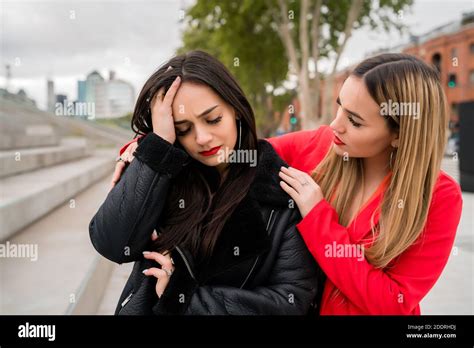 Sad Girl Crying Friend Comforting Hi Res Stock Photography And Images