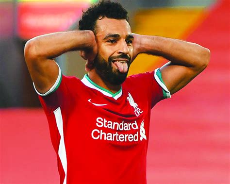 Mohamed salah celebrates with teammates after scoring the opening goal for liverpool during the second leg of the champions league against rb leipzig. Why Mo Salah would be a smashing signing for Barcelona