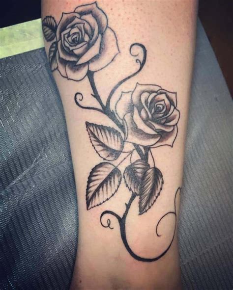 81 beautiful rose vine tattoo ideas [2024 inspiration guide] rose vine tattoos rose tattoo