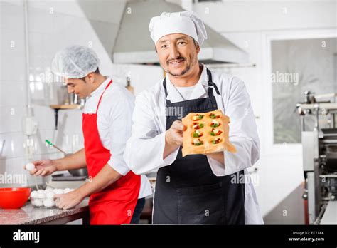 Chef Food Prepare In Commercial Kitchen Hi Res Stock Photography And