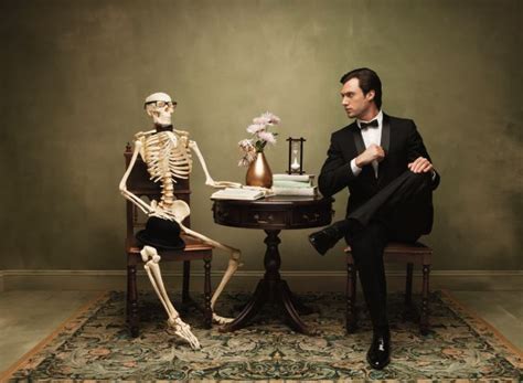 Was probably made by some divers wanting to have fun before your wife saw it i think.wouldnt make sense to me that the skeletons would be sitting upright on a table on the bottom of a lake. Man sitting next to a skeleton at a table | Man sitting ...