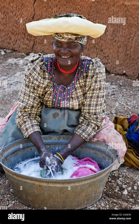 Herero Woman Washing Clothes Damaraland Namibia Stock Photo Alamy