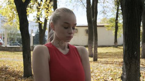 Fit Caucasian Busty Pretty Woman Walks Outdoors Along Ruined Statium Tribune Stock Video Video