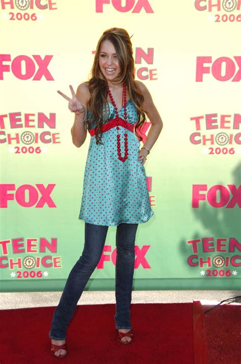 Miley Cyrus Dress Over Jeans Trend From The 2000s Popsugar Fashion