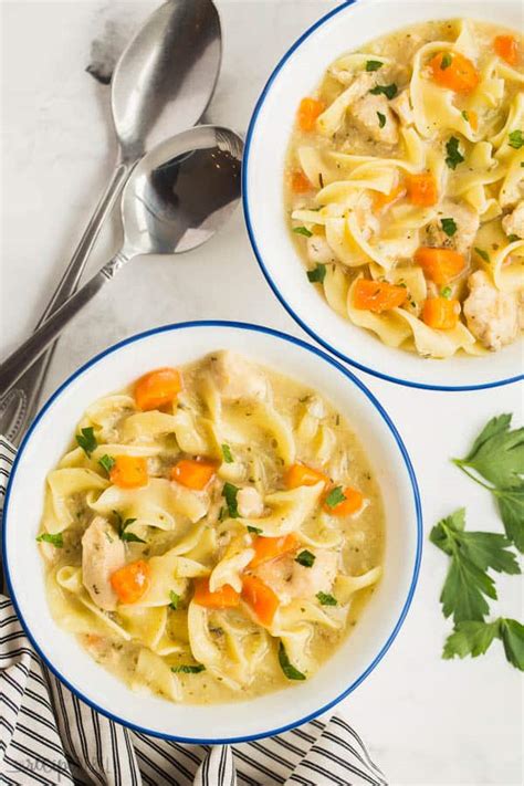 It's packed with tons of protein and veggies and is creamy as can be! Slow Cooker Creamy Chicken Noodle Soup - The Recipe Rebel