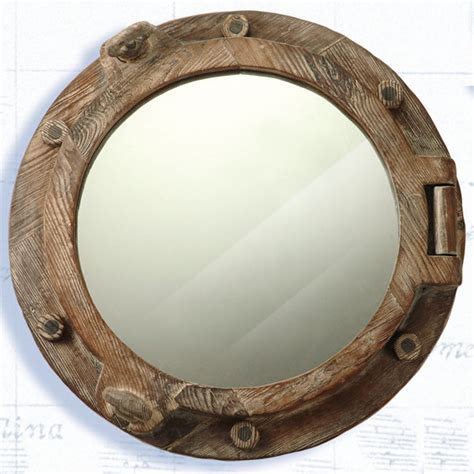 Every living room needs a sofa, every bedroom needs a bed and every bathroom needs a mirror. Robin's Dockside Shop - Portholes