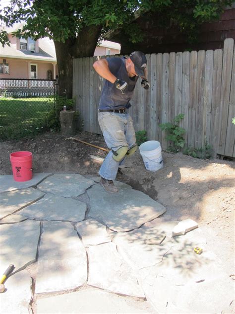 You'll want to add 4 inches of gravel and 1 inch of sand, plus the depth of the pavers. How to Install a Flagstone Patio with Irregular Stones ...