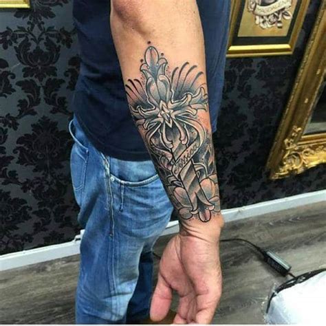 The tattoo consists of three nails joined together to make a cross. 125+ Best Cross Tattoos You Can Try! (+ Meanings) - Wild ...