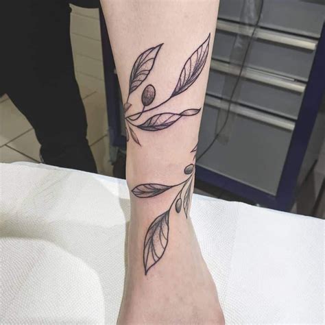 The Olive Branch Tattoo On The Wrist Around Arm Tattoo Olive Branch