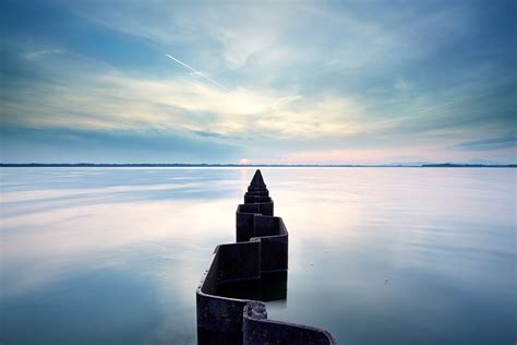 Photography Of Wall In Body Of Water Hd Wallpaper Wallpaper Flare