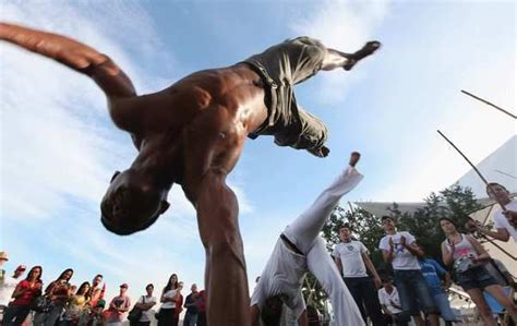 in rio brazilians demonstrate capoeira a martial art that combines elements of dance and music