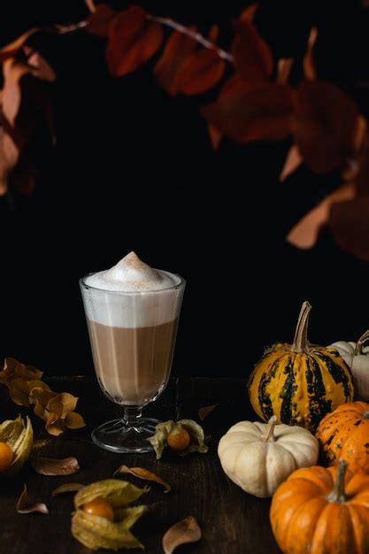 Premium Photo Fall Season Cosy Cappuccino Latte With Pumpkins