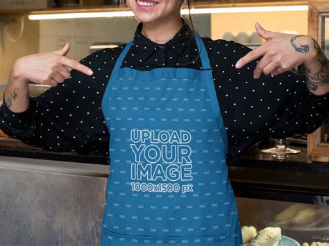 Download Placeit - Mockup of a Barista Pointing at Her Sublimated Apron