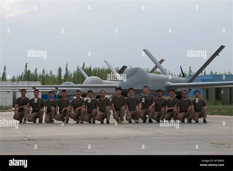 Chinese Technicians Pose With Cai Hong 4 Ch 4 Unmanned Aerial