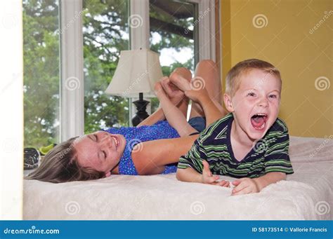 Child Getting Foot Tickled Stock Photo Image Of Giggle 58173514