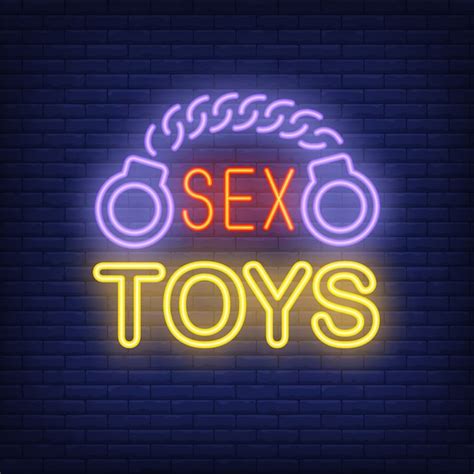 Handcuffs With Sex Toys Lettering Neon Sign On Brick Background