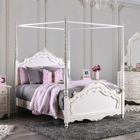 The canopies are nothing more than frames that sit on the beds with a cloth or veil on its structure. Traditional Wood Full Canopy bed in White Victoria by ...
