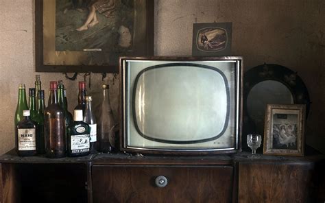 I picked up this old television at a flea market. Image antique Old Bottle Television