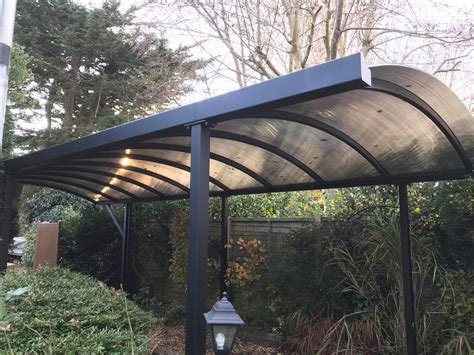You can use them as a picnic shelter, boat cover, and farm equipment storage area. A Long Double Carport Installed in Bognor Regis | Kappion Carports & Canopies