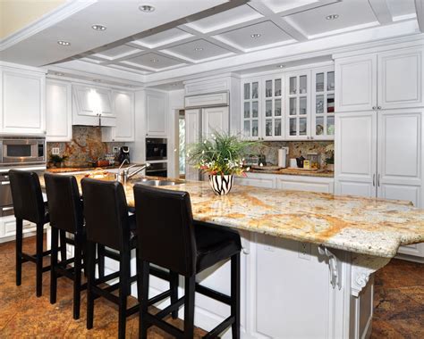 Extravagant Gourmet Kitchen Features A Stunning Granite Island And