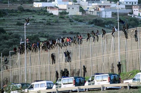 Hundreds Of Migrants Storm Spanish Enclave In North Africa One Dies