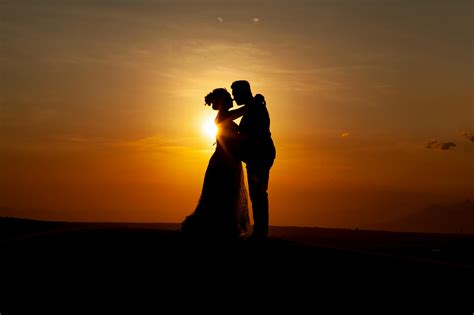 Silhouette Of Couple Kissing During Sunset · Free Stock Photo