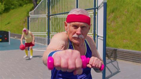 Senior Man Grandfather Doing Sport Training Boxing Fitness Aerobics Cardio Exercising With