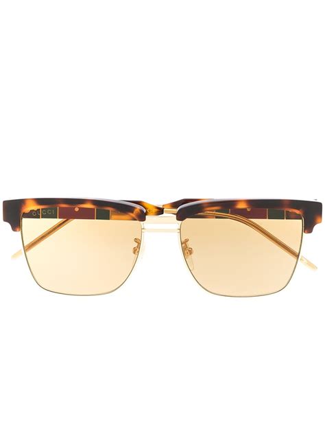gucci eyewear tortoiseshell effect sunglasses farfetch