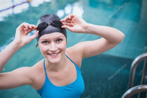 Pretty Woman Wearing Swim Cap And Swimming Goggles At The Pool In 2021