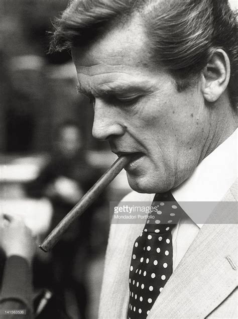 James Bond Movie Posters James Bond Movies Roger Moore Smoking