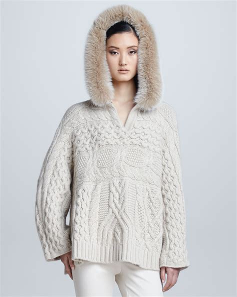Loro piana is renowned for producing luxury clothing and accessories made from the finest natural materials since 1924. Loro piana Cableknit Furhooded Cashmere Cape in White | Lyst
