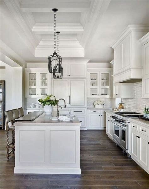 A coat of light beige paint and ample sunlight streaming in through the windows allow the kitchen to feel spacious and airy. 41+ Comfy White Kitchen Dark Floors Ideas | Farmhouse ...