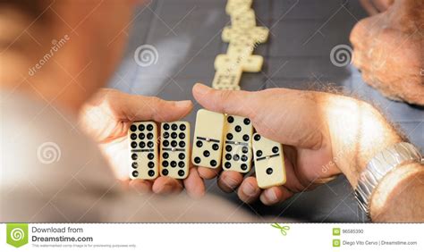 Retired Senior Man Playing Domino Game With Friends Stock Photo Image
