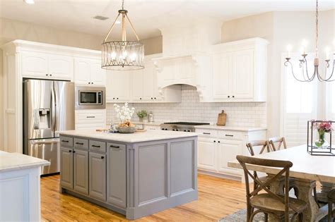Light wood floors can be very pleasing with white cabinets. White and Gray cabinets with natural wood floors ...