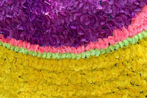 Background Of Colorful Fake Flowers That Decorated The Backdrop Stock