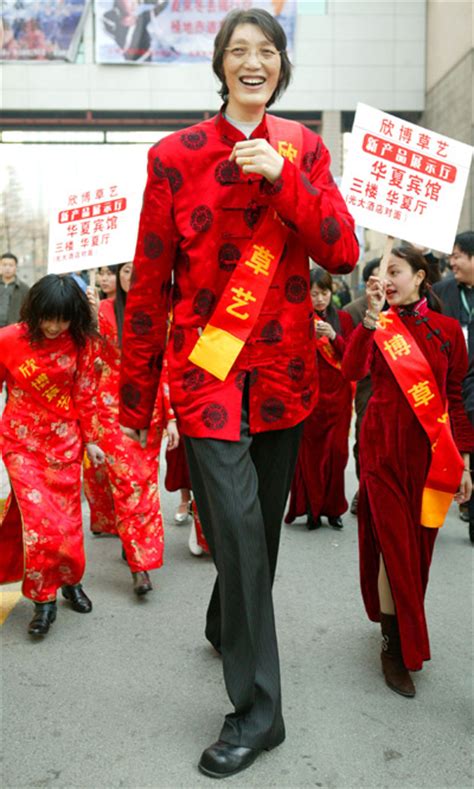 240 cm = 0.0328084 * 240 feet = 7.8740157 feet. Asia's tallest man promotes textile exhibition