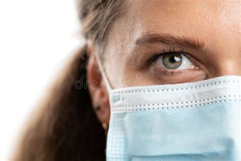 Close Up Of Female Model Half Face Wearing Disposable Mask Stock Image