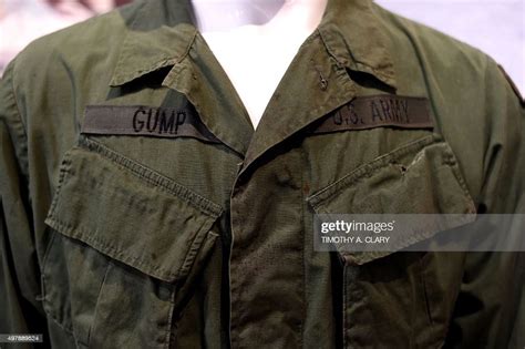A Tom Hanks Army Uniform From Forrest Gump Is Displayed During A