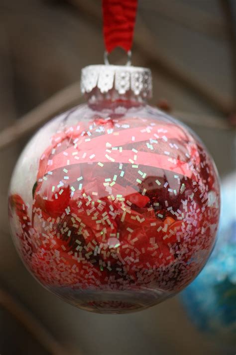 Colour-themed clear glass or plastic ornaments