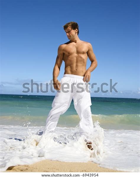 Physically Fit Shirtless Man Standing On Stock Photo Edit Now