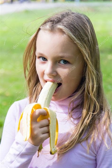 Girl Are Eating Banana Stock Photo By Julialine