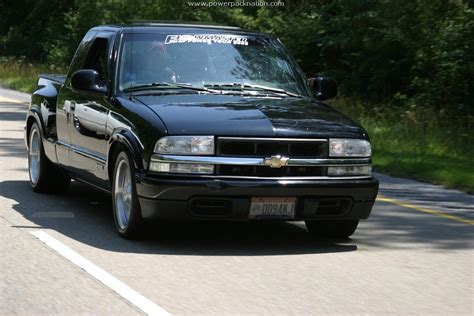A Very Clean And Lowered Chevrolet S 10 Pickup Truck Cruising Down The