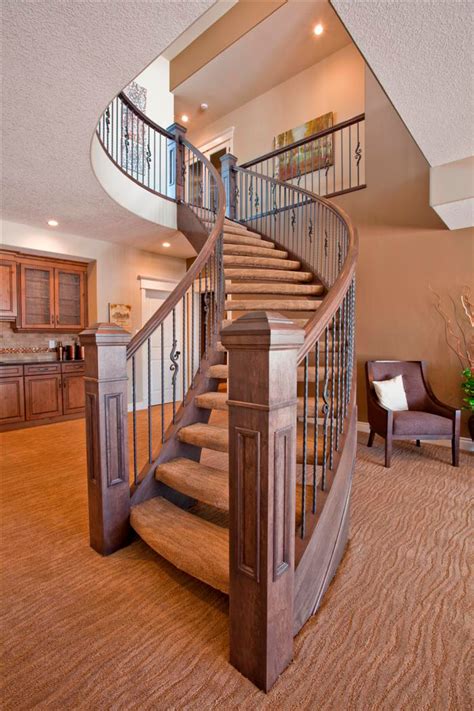 Home staircases in india change shape and size depends space available , and the size of the family. Curved Staircase - Wood and Metal Designs | Artistic ...