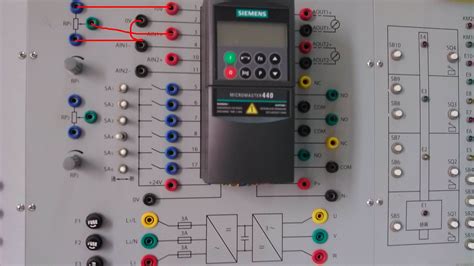 Plc模拟输入信号控制变频器的参数设定 机电之家网变频器技术网