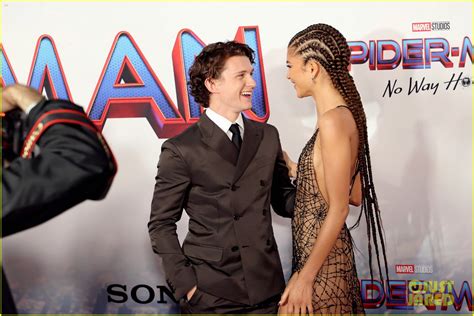 zendaya wows in spiderweb print dress alongside tom holland at spider man no way home