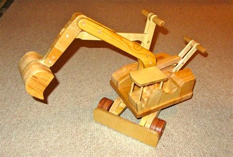 Bauen sie hochwertiges holzspielzeug für kinder ab 10 monaten einfach selbst! Kinder-Holzspielzeug, Bagger Bauanleitung zum selber bauen ...