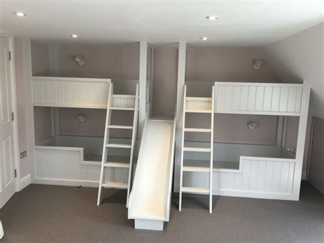 Loft bed with storage and a desktop space Quadruple Bunk bed and slide build by Rubix construction and development | girls room ...